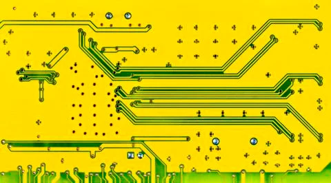 Close up of a yellow computer microcircuit Photos