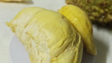 Close up of yellow durian pulp. Stockbeeldmateriaal 339338193