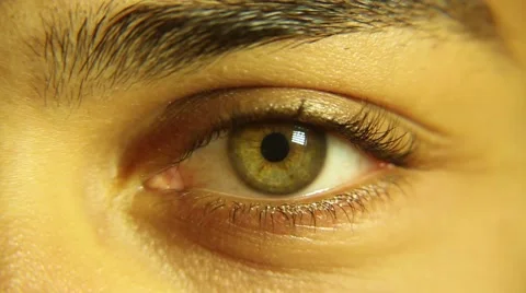 Close up of yellow eye on biracial man Stock Footage 45524802