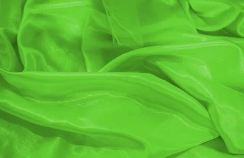 Close up on yellow green material background or texture Foto stock