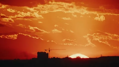 Close up yellow orange red sky the sun goes down sunset twilight. Urban Stock Footage 201962420