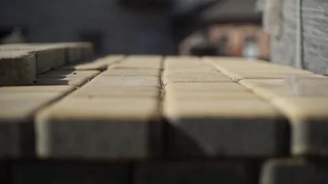A close-up of yellow paving slabs with blurred backgrounds. Copy space Видео 200869392