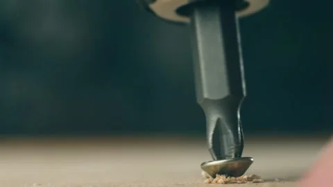 Close-up yellow self tapping screw unscrewing from board by man. Macro view 스톡 동영상 311988139