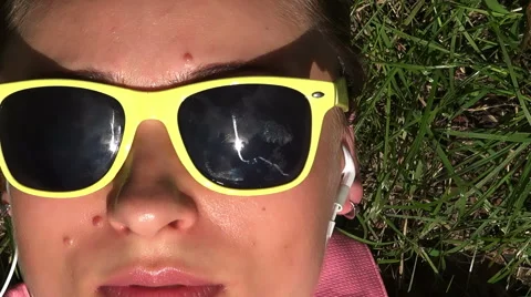 Close up of yellow sunglasses Stock Footage 40058673