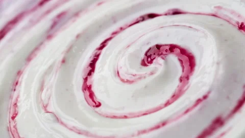 Close up of yogurt with fruit jam, curd cream swirl with berry topping Video stock 147647116