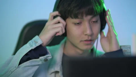 Close up of Young Asian man pro Gamer Playing in Online Cyber Sport Game at home Video stock 150555320