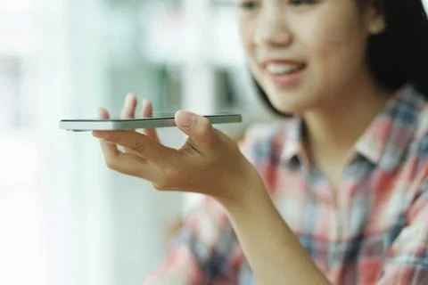Close up young asian woman using mobile phone. Stock Illustration