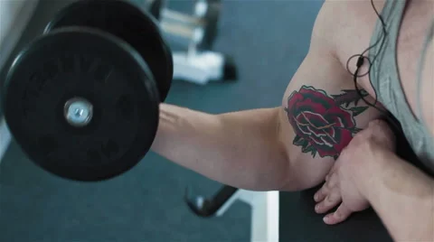 Close-up of a young athletes’ arm exercising with weights Stock Footage 49159943