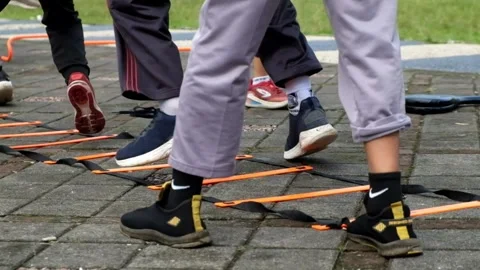 Close up of young athletes training in the square Stock Footage 273991377