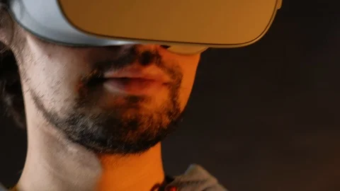 Close-up young bearded man in vr glasses saying wow in excitment Stock Footage 101405603