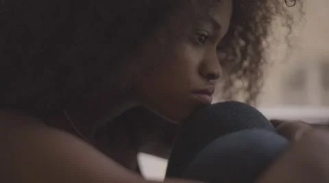 Close up of young beautiful black woman feeling very sad. Gorgeous girl  Stock Footage