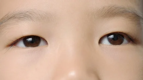 Close up young boy eyes opening Stock-Footage 101812119