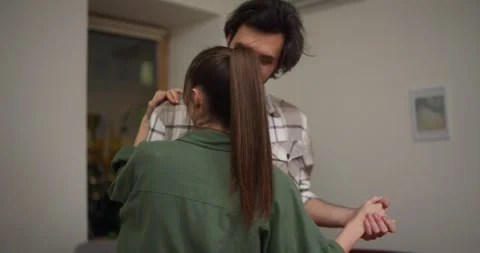 Close up of Young brunette guy dancing a slow dance with elements of classical Stock Footage 315011519