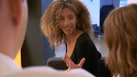 Close-up of young business executives talking with each other in office Vídeo Stock 114872818