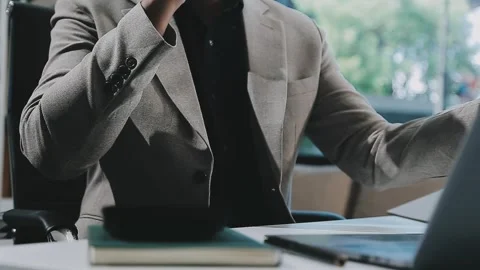 Close up young businessman analyzing project statistics working on computer.. Stock Footage 276326820