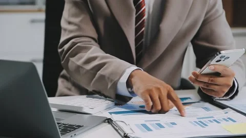 Close up young businessman analyzing project statistics working on computer.. Stock Footage 276326847