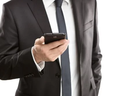 Close up of young businessman using smart phone isolated on white background Stock Photos