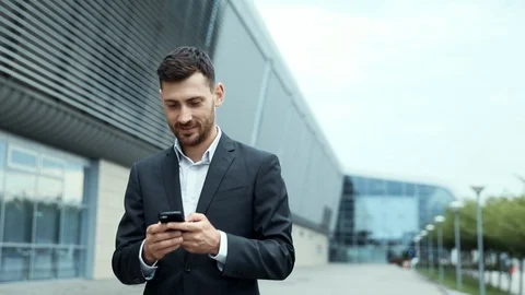 Close up of Young Businessman Walking near the Modern Airport.  Stock Footage