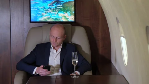 Close Up of a Young Businessman Working Using a Phone Business flying Stock Footage 135593213