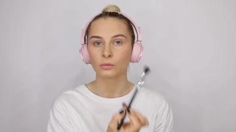Close up young caucasian model eyebrow pinching professional makeup. Beautiful Stock Footage 112661761