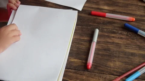 Close up of a young childs hand coloring. Stock Footage 72912148