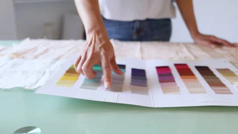 Close up of a young creative designer comparing colors Stock Footage 130595313