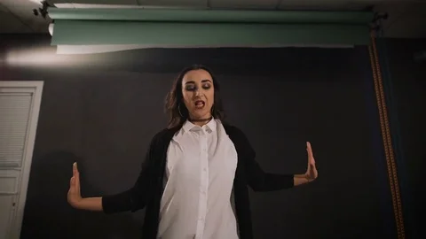 Close up of young dancer in white shirt and black jacket showing modern dancing Stock Footage 70451180