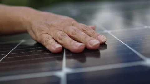 Close up of young engineer hand is checking the operation of sun and cleanliness Stock Footage 231502008
