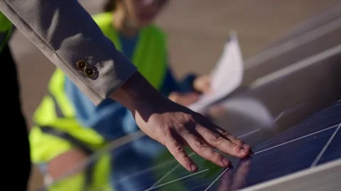 Close up of young engineer hand is checking the operation of sun and cleanliness Stock Footage 240519504
