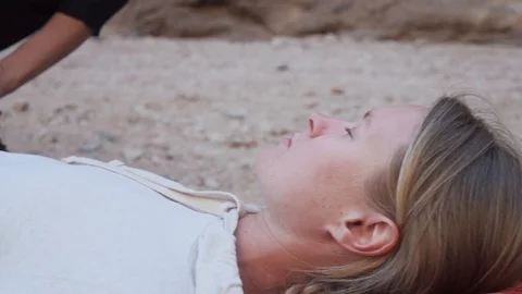 Close up young female shiatsu practicer doing treatment session in mountains 4k Stock Footage 106916087