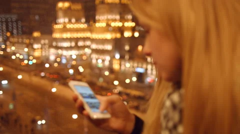 Close Up of young girl hands typing sms scrolling pictures phone.  Stock Footage 59331858