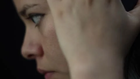Close-up of Young Girl Using Computer with Headphones Stock Footage 337532793