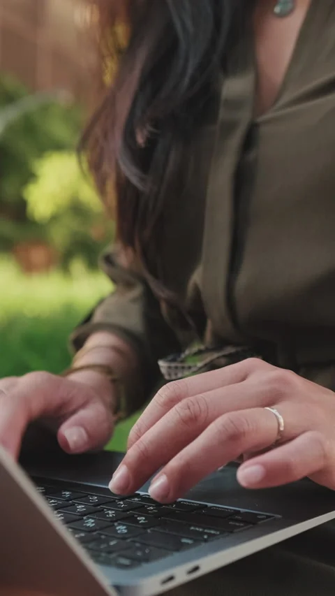 Close-up of young girl's hands using laptop pc Stock Footage 227025104