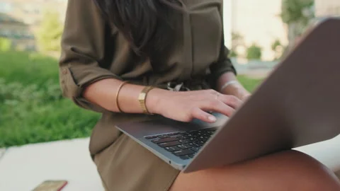 Close-up of young girl's hands using laptop pc Stock Footage 227109872