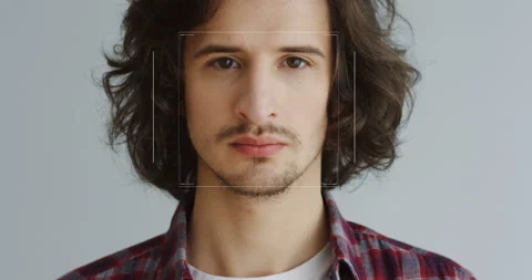 Close up of young guy with identification of biometric. Facial recognition of Stock Footage 132457875
