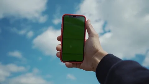 Close up young hand hold phone with vert... | Stock Video | Pond5