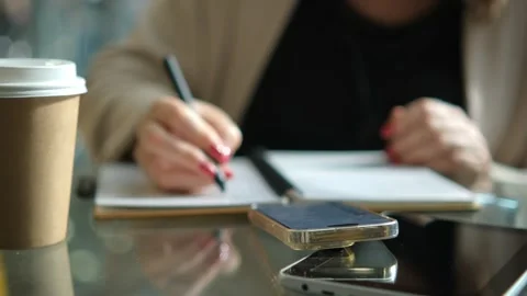 Close-up young lady freelance focus mobile phone chat with colleagues work Stock Footage 258650865