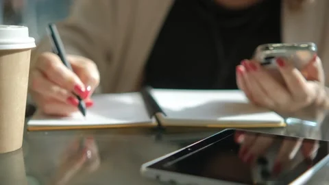 Close-up young lady freelance focus mobile phone chat with colleagues work Video stock 276589633