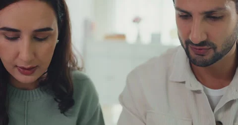 Close up young Latin couple check document paper pay bills online plan budget. Stock Footage 337041993