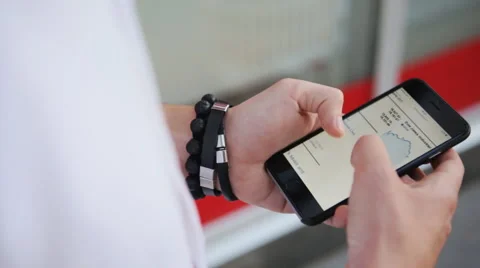 Close-up of young male hands using smartphone Stock Footage 62312893