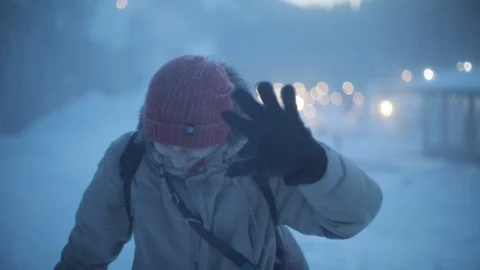 Close up young man with backpack during snowstorm in the snowy mountains winter Stock-Footage 105108853