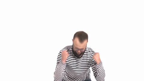 Close-up of a young man with beard wearing glasses looking happy. Positive Stock Footage 120987145