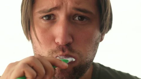 Close up of a young man brushing his teeth 스톡 동영상 47852334