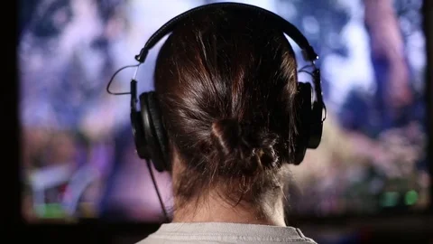 Close Up of Young Man Captivated by Video Games Stock Footage 69747691