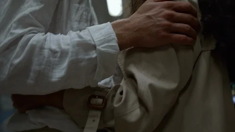 Close up of a young man caressing his girlfriend on a platform in the subway. Video stock 116028372