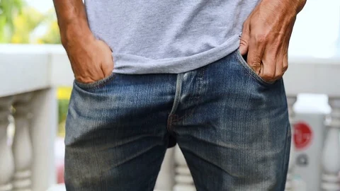 Close up young man with empties pockets. No money, concept of poor Stock Footage 120380543