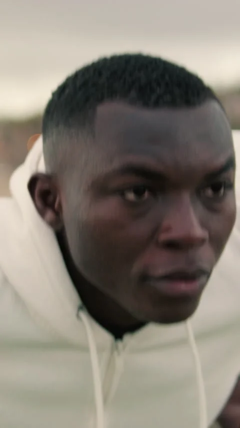 Close-up of young man exercising on parallel bars outdoors Stock-Footage 292582361