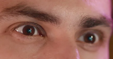 Close-up of a young man, eyes look at the monitor, work with a computer, laptop Stock Footage 171708979