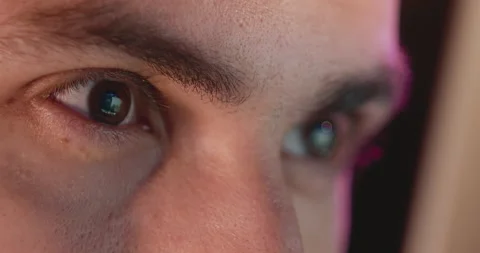 Close-up of a young man, eyes look at the monitor, work with a computer, laptop Stock Footage 201442458