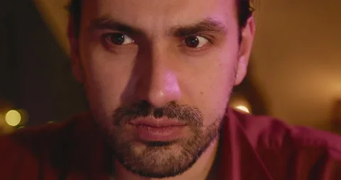 Close-up of a young man, eyes look at the monitor, work with a computer, laptop Stock Footage 212017378